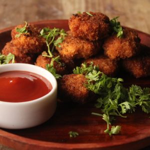 Breaded chicken pieces